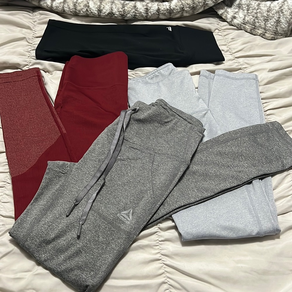 A regular long work out tights and 1 black biker Fabletics shorts
